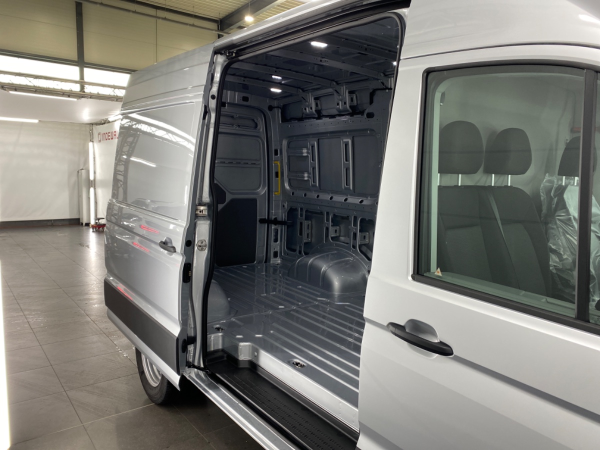 MAN TGE 5.160 L3H3 RWD Dubb. Lucht AUT8 | Reflex silver | Climatronic | Assist pak | Comfortpak. Plus | Bsn Navi | Licht Zicht (LED) | Trekhaak 3,5t | Adaptive Cruise | Schuifdeur links